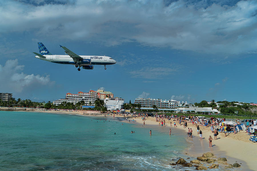 jetBlue landing at St. Maarten Airport. Photograph by David Gleeson