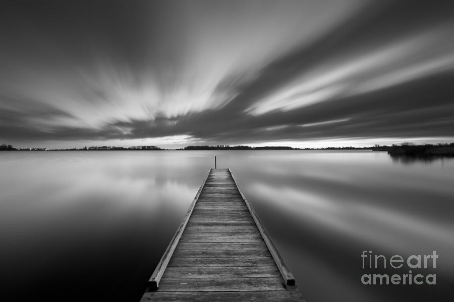 Black And White Photograph - Jetty on a lake in black and white by Sara Winter