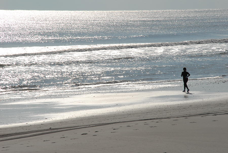 Jog On The Beach Photograph by Steven DeFelice - Pixels