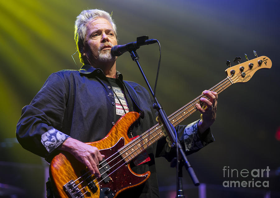 John Cowan with The Doobie Brothers Photograph by David Oppenheimer