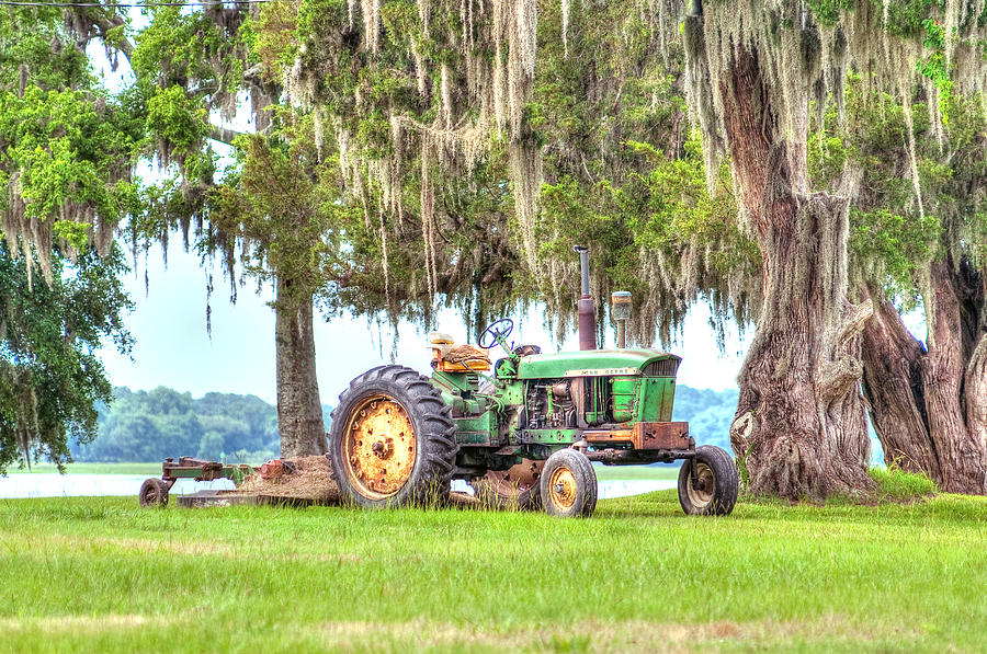 John Deer Tractor Under the Old Cedar Tree Photograph by Scott Hansen