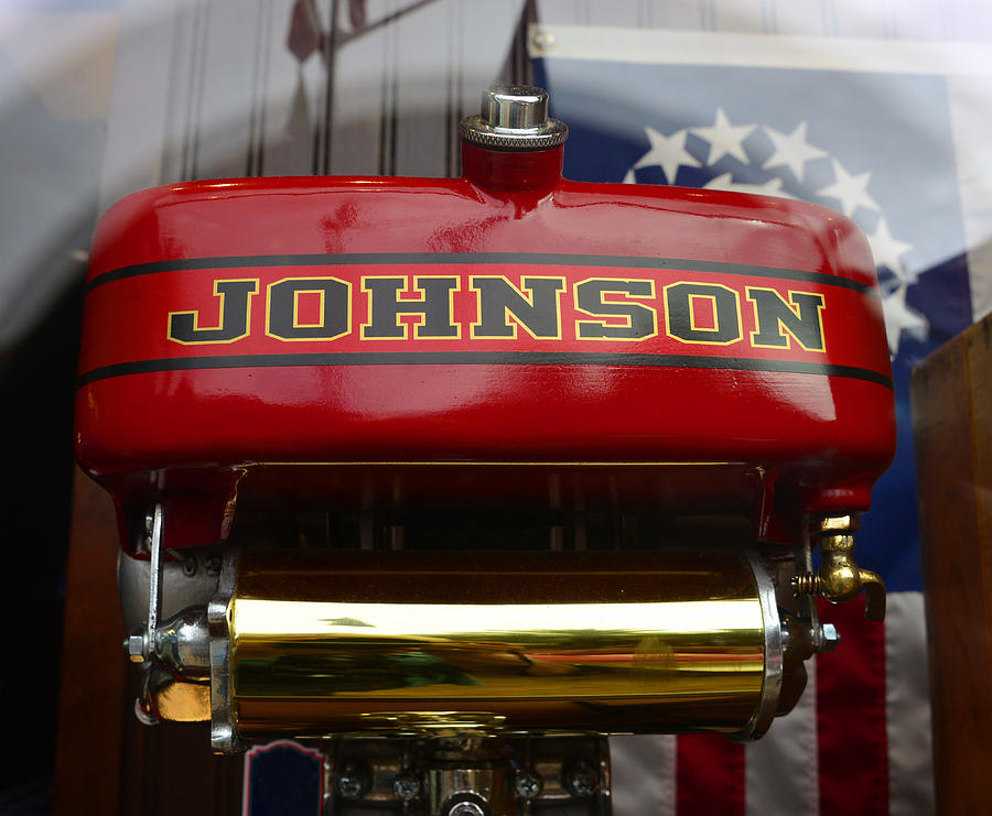 Johnson outboard with nautical flag Photograph by David Lee Thompson