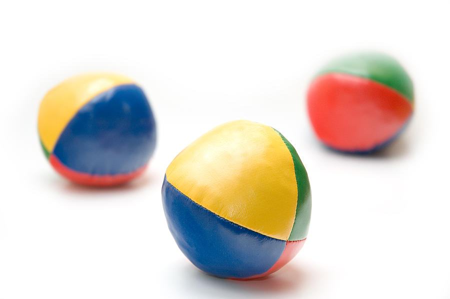 Juggling Balls Photograph by Jeremy Voisey