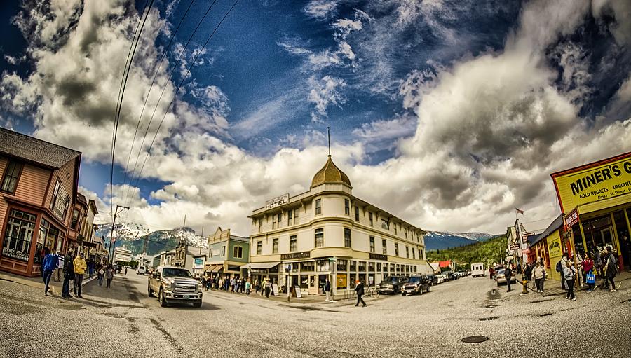 June 2017 Skagway Alaska - street view with cruise ship and moun Photograph by Alex Grichenko