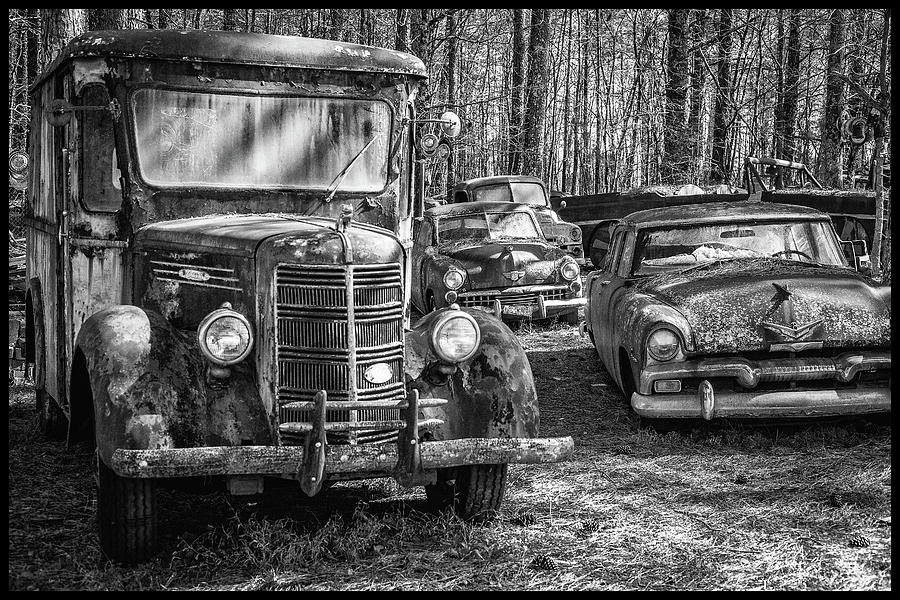 Junked Mack truck ad old Plymouth Photograph by Matthew Pace