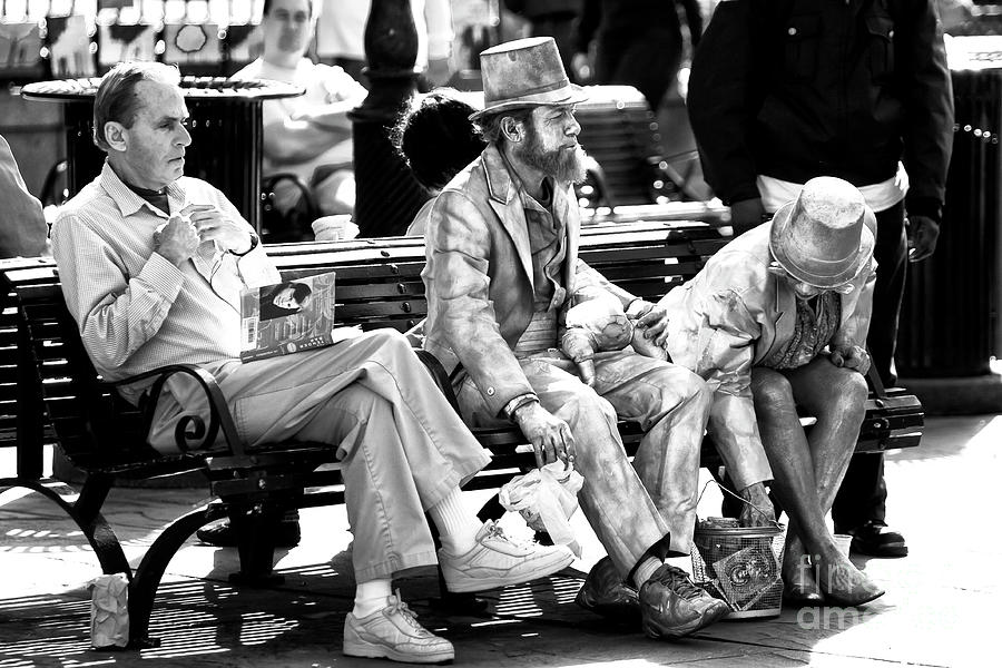 Just Another Day in Jackson Square New Orleans Photograph by John Rizzuto