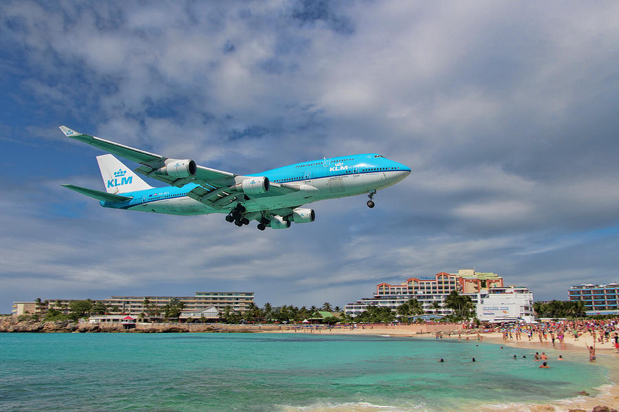 K L M 747 landing at St. Maarten Photograph by David Gleeson
