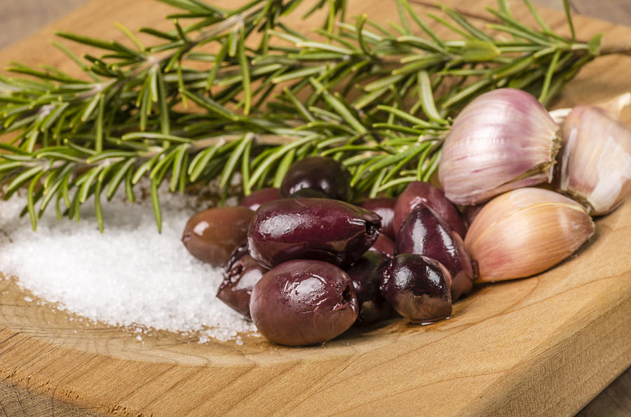Kalamata olives and rosemary with salt Photograph by John Trax