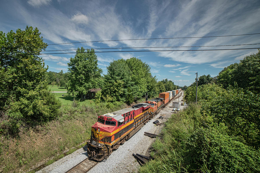 Kansas City Southern 4771 leads CSX Q029-23 at Kelly Ky Photograph by Jim Pearson