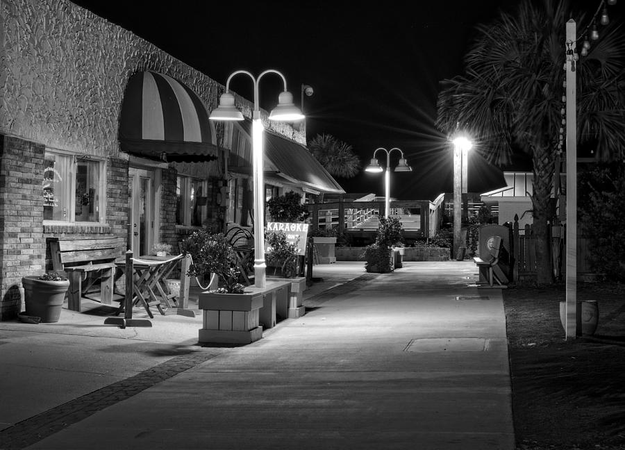 Karaoke On Carolina Beach Boardwalk in Black and White Photograph by Greg and Chrystal Mimbs