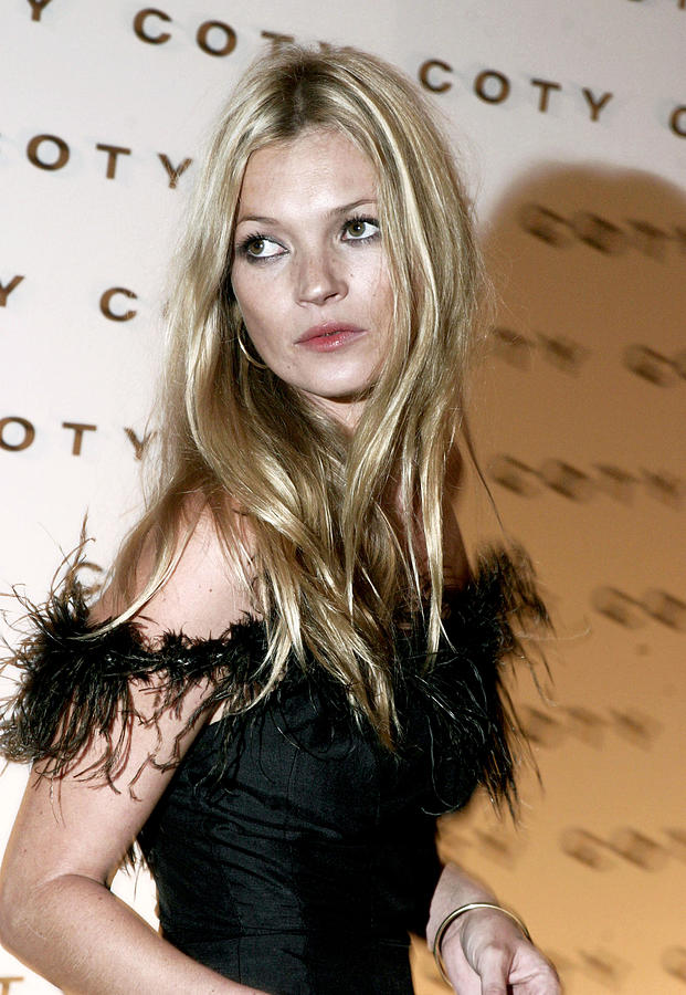 Portrait Photograph - Kate Moss  At The Coty 100th by Everett