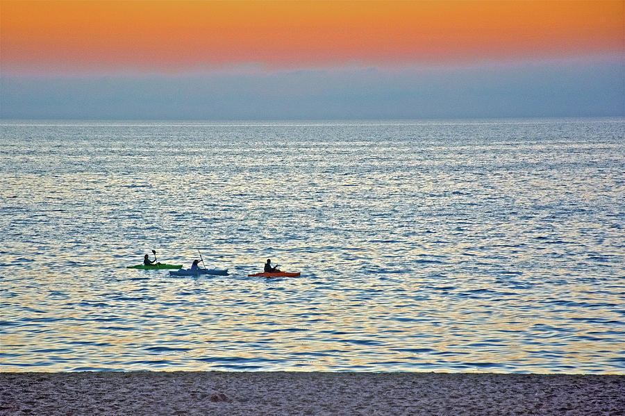 Kayakers on Lake Michigan at Sunset from North Beach Park in Ottawa County, Michigan  Photograph by Ruth Hager
