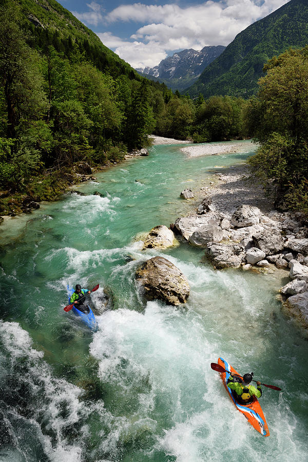Triglav National Park Photograph - Kayakers shooting the cold emerald green alpine water of the Upp by Reimar Gaertner