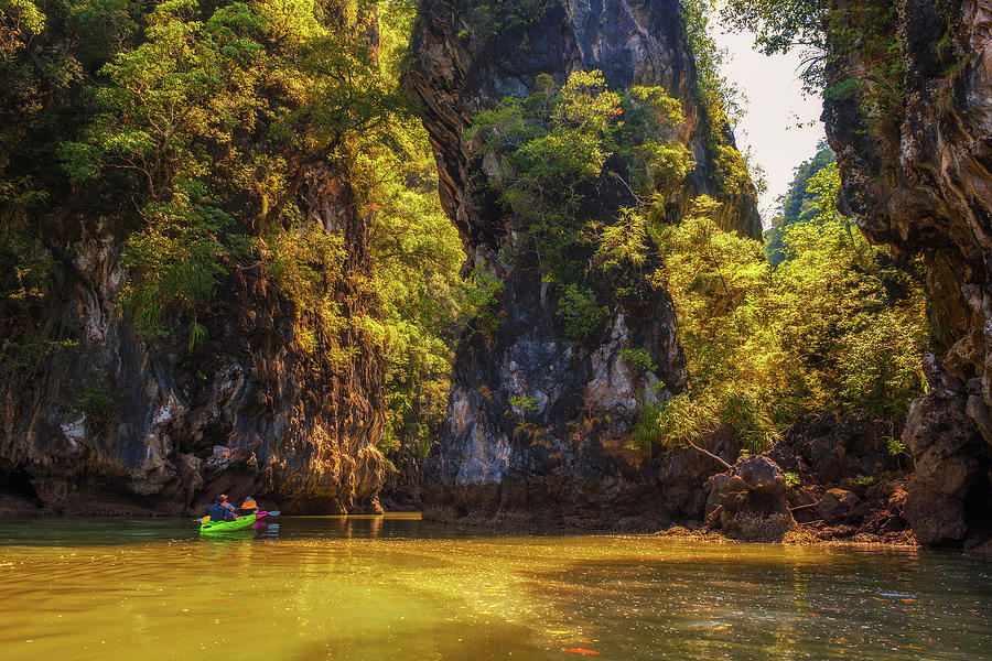 Kayaking under high cliffs in Thailand Photograph by Miroslav Liska ...