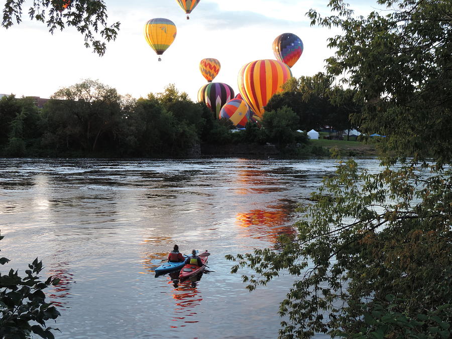 Kayaks and Balloons Photograph by Bill Tomsa