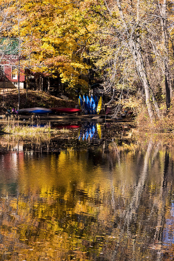 Kayaks In Autumn Photograph by Tom Singleton