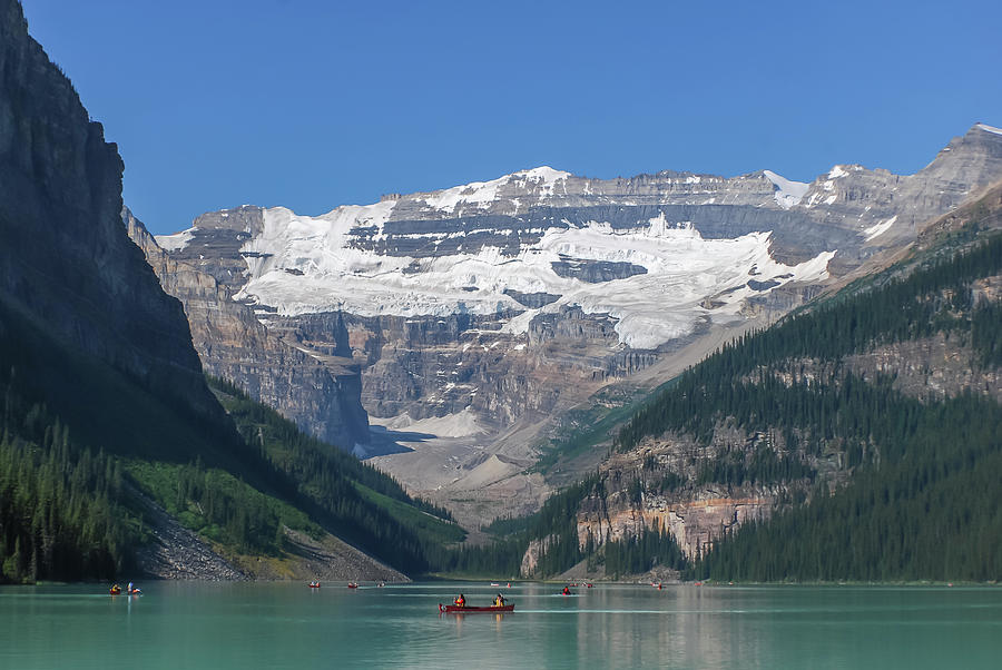 Kayaks on Lake Louise Canada Photograph by Terry DeLuco