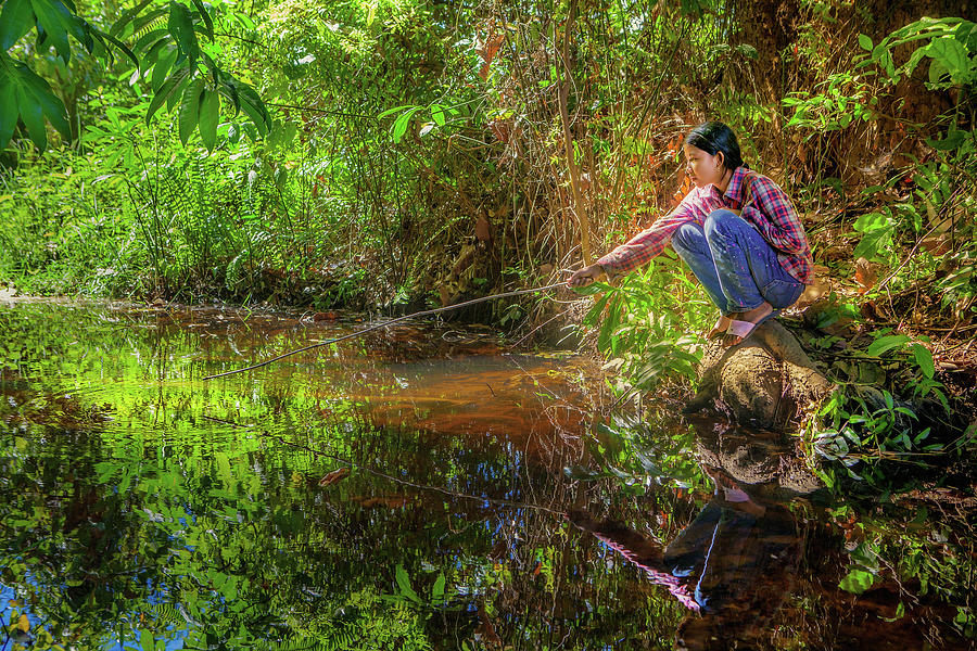 Khmer Woman Fishing - Cambodia by Art Phaneuf
