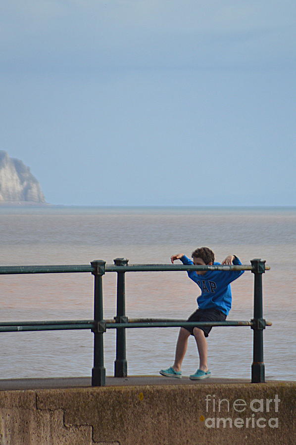 Kid and Railings Photograph by Andy Thompson