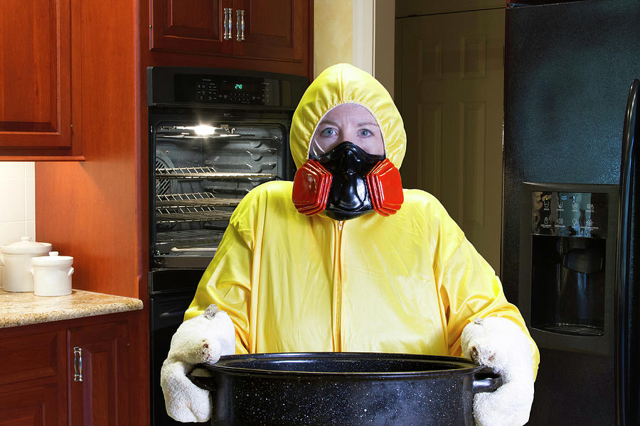 Kitchen disaster in kitchen with HazMat Suit Photograph by Karen Foley