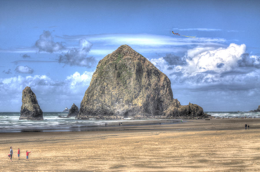 Kite Flying at Haystack Rock Photograph by Don Wolf