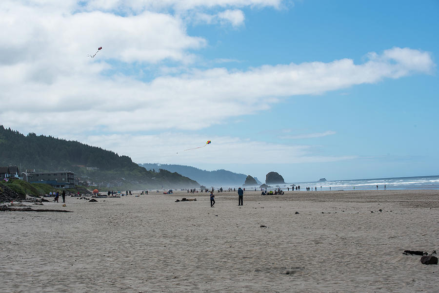 Kite Flying On Cannon Beach Photograph by Tom Cochran