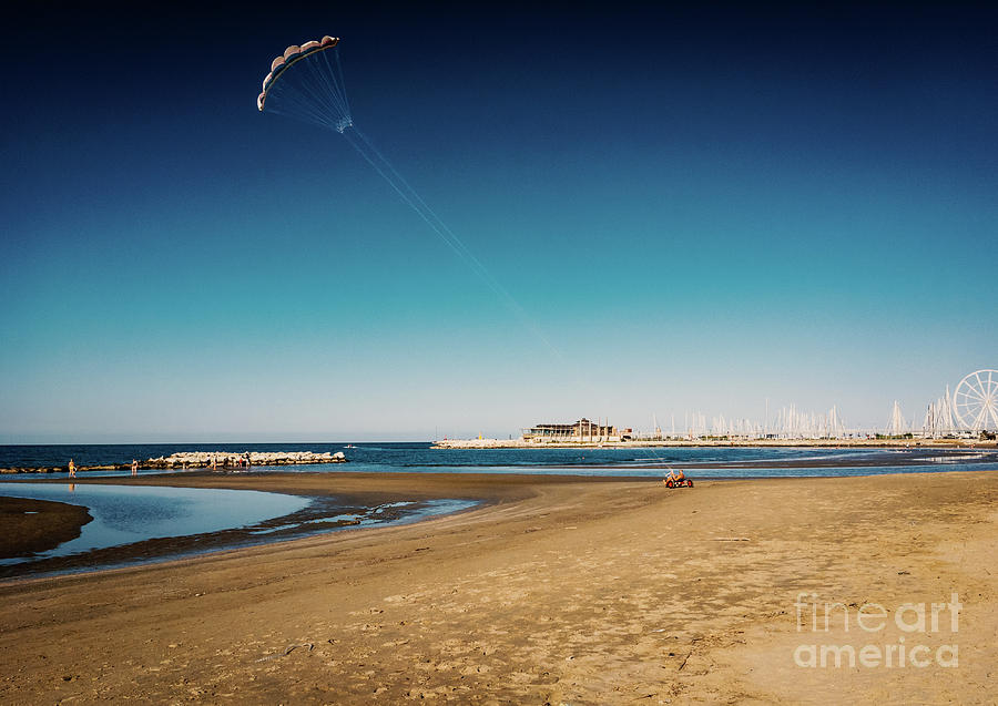 Kitesurf on the beach Photograph by Marina Usmanskaya