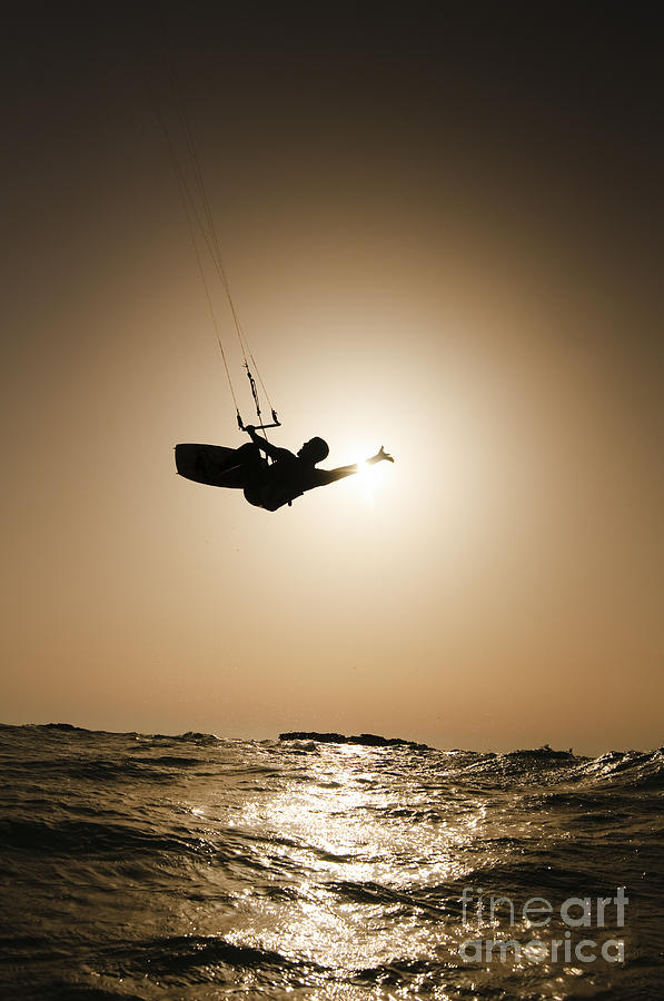 Kitesurfing at sunset Photograph by Hagai Nativ
