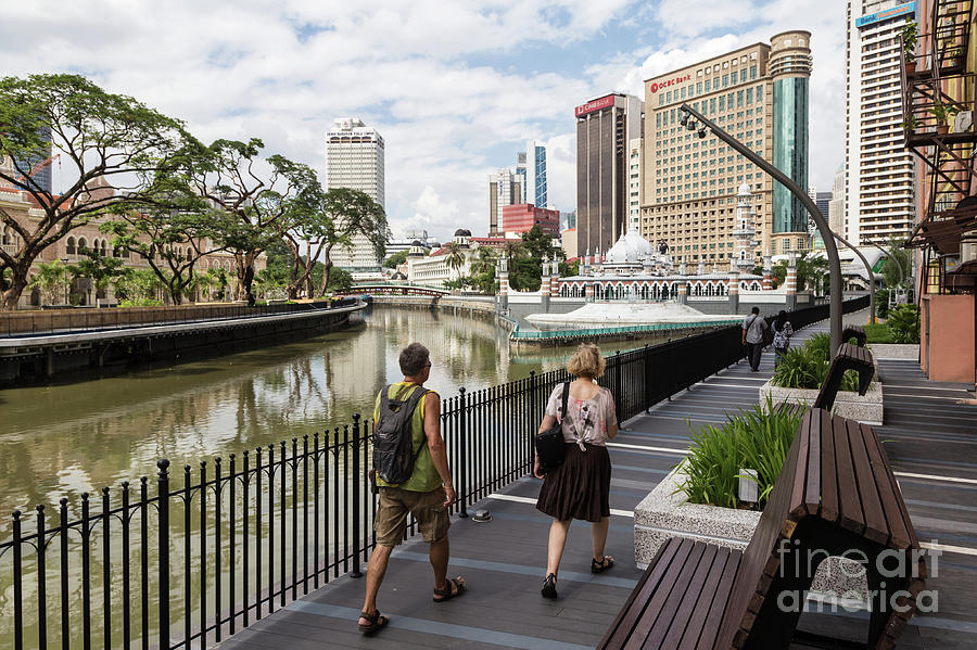 Klang river promenade and Masjid Jamek mosque on a sunny day in  Photograph by Didier Marti