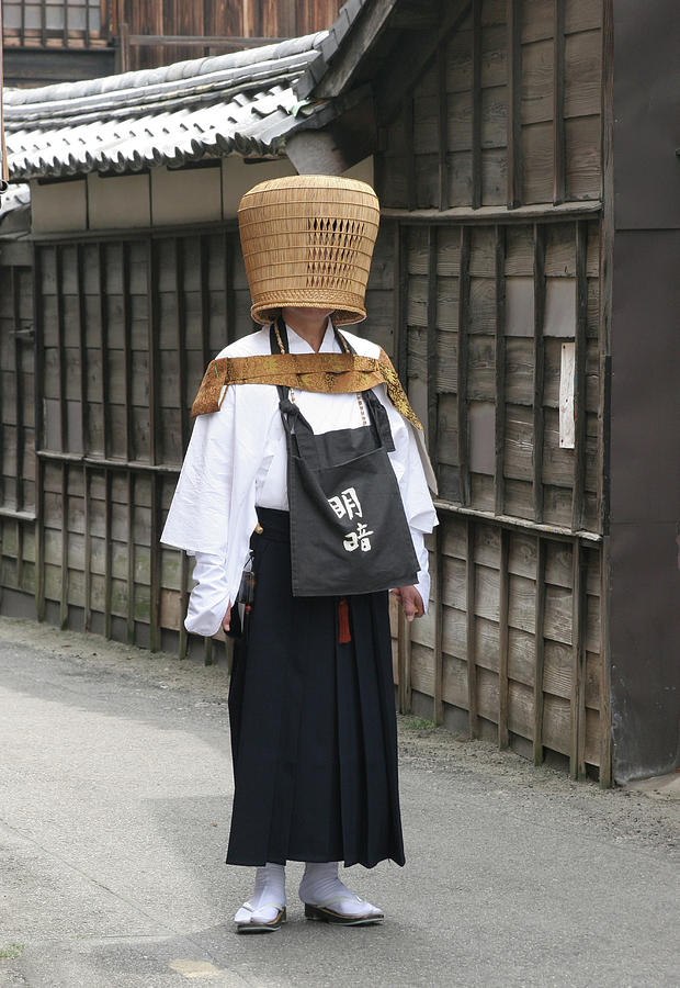 Komuso in the street Photograph by Masami Iida