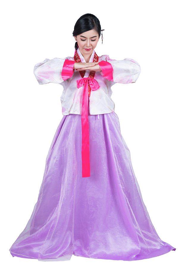 Korean lady in greeting action and Korea original dress Photograph by Anek Suwannaphoom