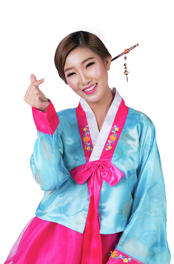 Korean lady show symbol of love by hand and Korea original dress Photograph by Anek Suwannaphoom
