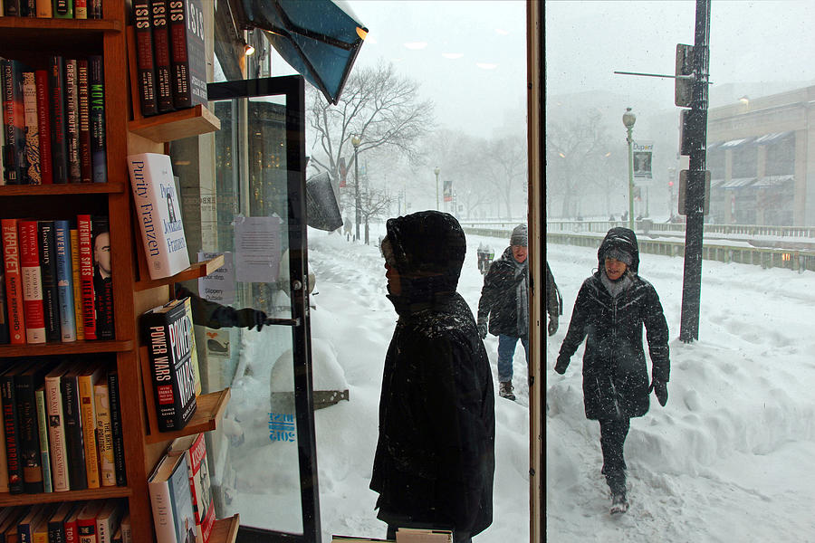 Kramerbooks -- Coming And Going During A Snow Storm Photograph by Cora Wandel