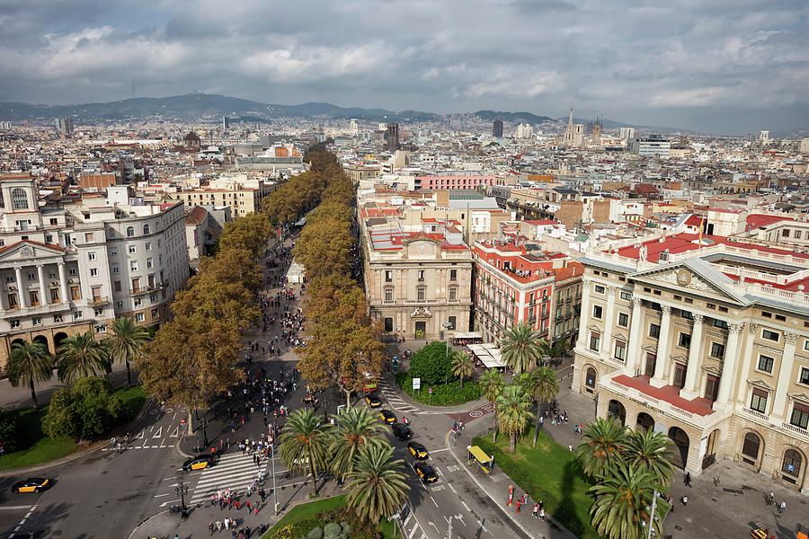 La Rambla Street and Barcelona Cityscape Photograph by Artur Bogacki