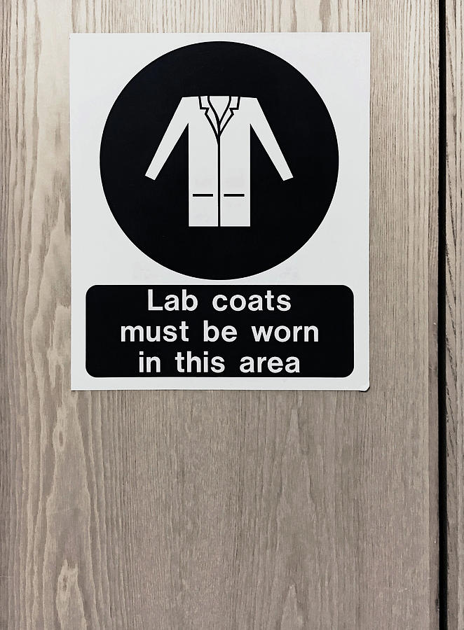 Lab coats sign Photograph by Tom Gowanlock