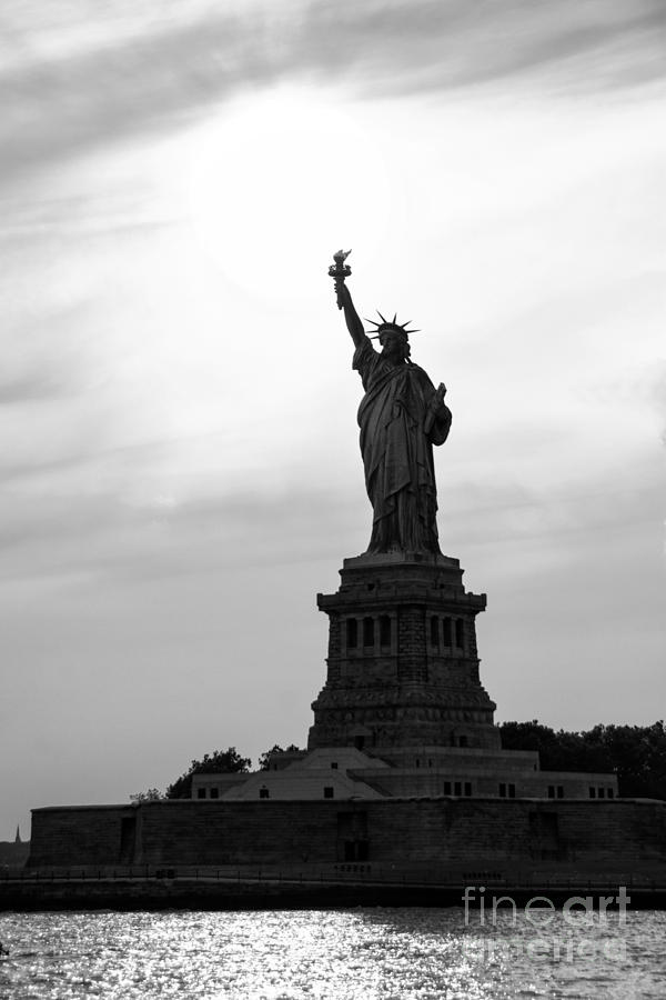 Statue Of Liberty Photograph - Lady Liberty in Sundown Silhouette by Regina Geoghan