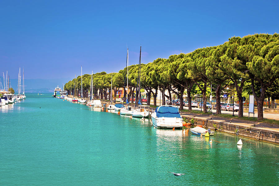 Lago di garda turquoise harbor in Peschiera view Photograph by Brch Photography