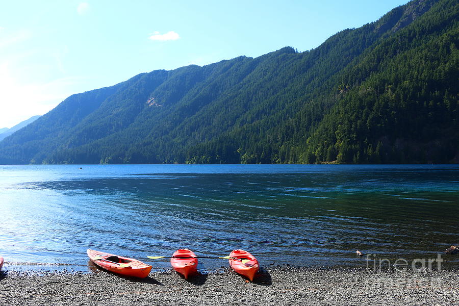 Lake Crescent With Beached Canoes Photograph by Christiane Schulze Art And Photography