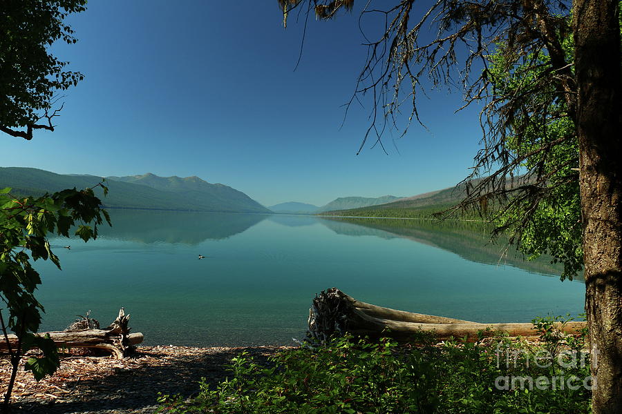  Lake McDonald Moody Morning Photograph by Christiane Schulze Art And Photography