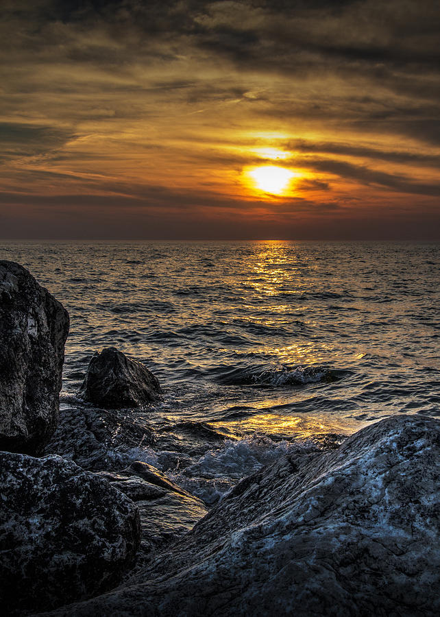 Lake Michigan Sunset by the Breakwater Rocks at Holland Michigan Photograph by Randall Nyhof Lake Michigan Sunset by the Breakwater Rocks at Holland Michigan Photograph by Randall Nyhof