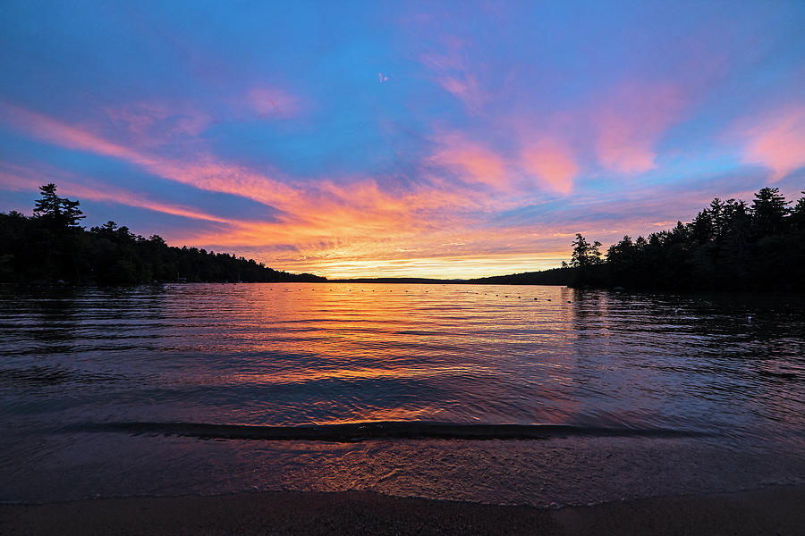 Lake Winnipesaukee sunset Carry Beach Wolfeboro NH Blue Skies Photograph by Toby McGuire