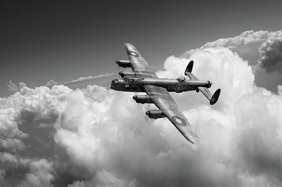 Lancaster KB799 above clouds BW version Photograph by Gary Eason