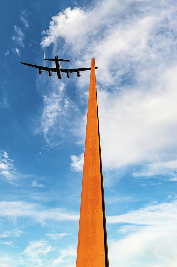 Lancaster over the IBCC spire Photograph by Gary Eason