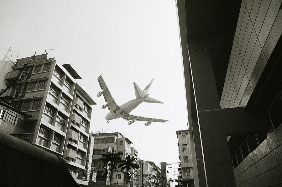 Landing in Hong Kong Photograph by Shaun Higson