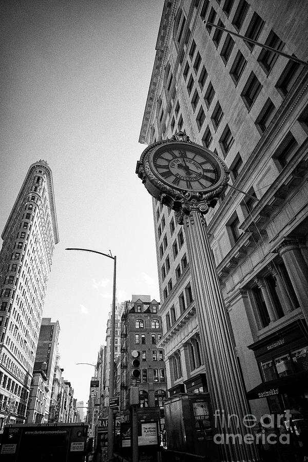 Landmark Photograph - landmark fifth avenue building clock outside the toy center and gridiron building New York City USA by Joe Fox