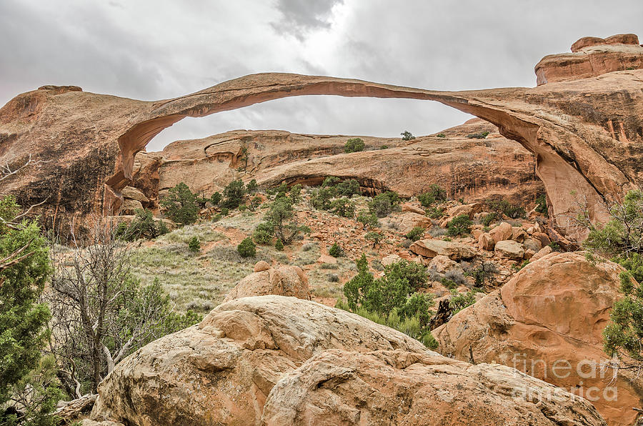 Landscape Arch Against a Cloudy Sky Photograph by Sue Smith