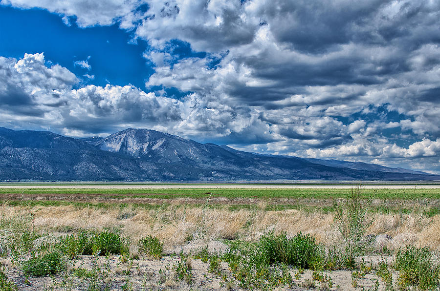 Landscape of Dried Out Lakebed, Strong Horizon, Mountains and Dramatic Sky Photograph by Brian Ball