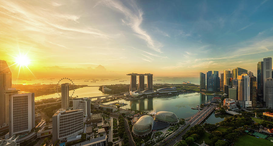 Landscape of Singapore city in morning light sunrise Photograph by Anek Suwannaphoom