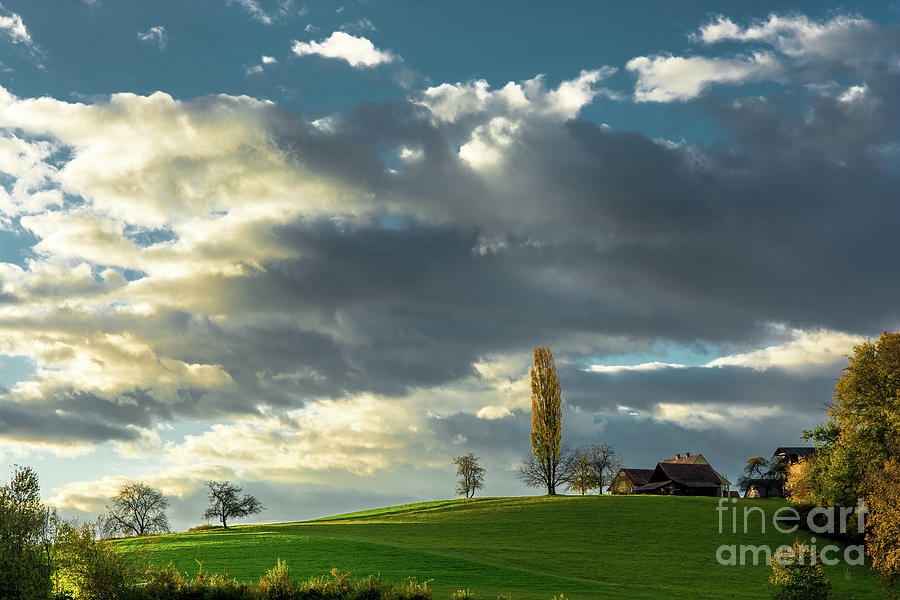 Landscape With House and Sunlit Hill in Austria Photograph by Andreas Berthold