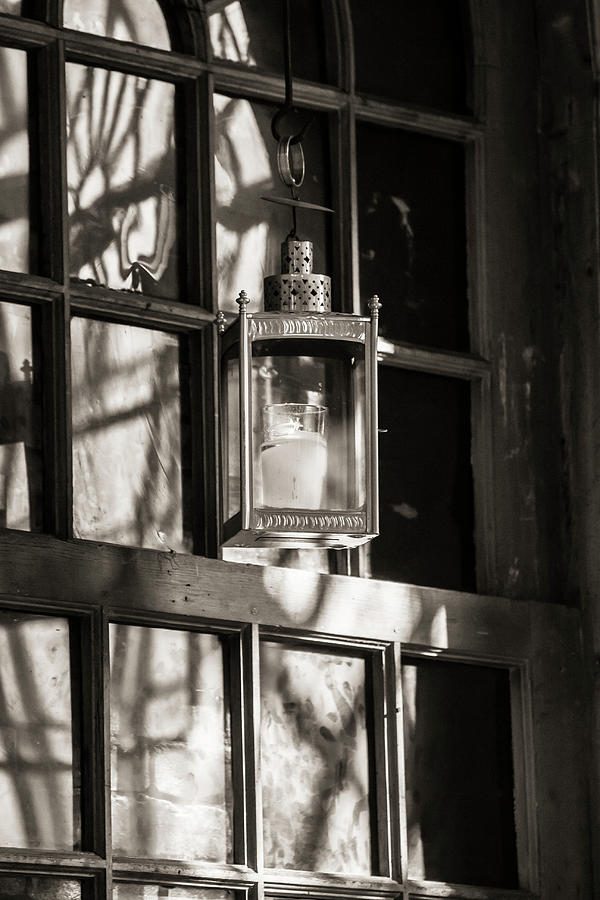 Lantern in a window 2 Photograph by Jason Hughes
